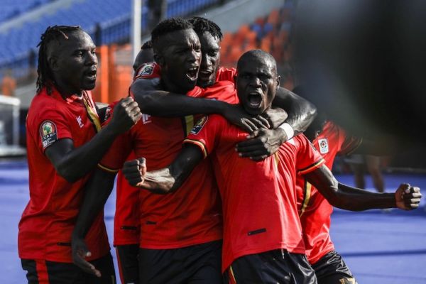 Uganda's Patrick Kaddu (R) celebrates with is teammates after scoring his side's first goal during the 2019 Africa Cup of Nations Group A soccer match between the Democratic Republic of the Congo and Uganda at the Cairo International Stadium. PHOTO/AFP