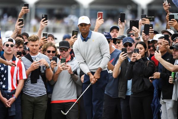 US player Tiger Woods chips onto the green during the second day of the Presidents Cup golf tournament in Melbourne on December 13, 2019. PHOTO | AFP
