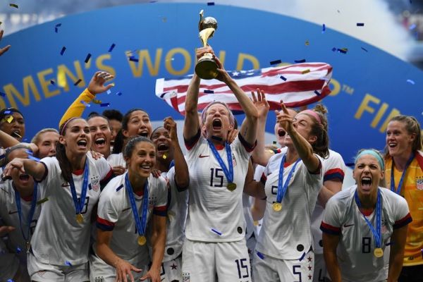USA's players including forward Megan Rapinoe (C) celebrate with the trophy after the France 2019 Women’s World Cup football final match between USA and the Netherlands, on July 7, 2019, at the Lyon Stadium in Lyon, central-eastern France. PHOTO/AFP