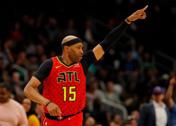 Vince Carter #15 of the Atlanta Hawks reacts after hitting a three-point basket against the Memphis Grizzlies in the first half at State Farm Arena on March 13, 2019 in Atlanta, Georgia. PHOTO | AFP