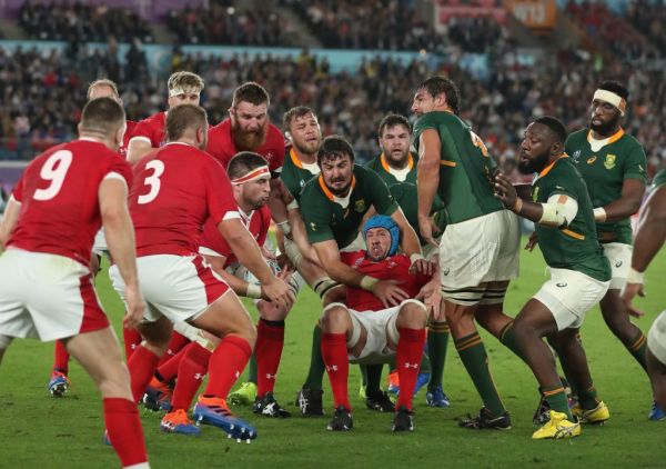 Wales' and South Africa's players struggle to hold a ball during the first half of the Semi-Finals in the 2019 Rugby World Cup Japan at International Stadium Yokohama in Yokohama, Kanagawa Prefecture on Oct. 27, 2019. PHOTO | AFP