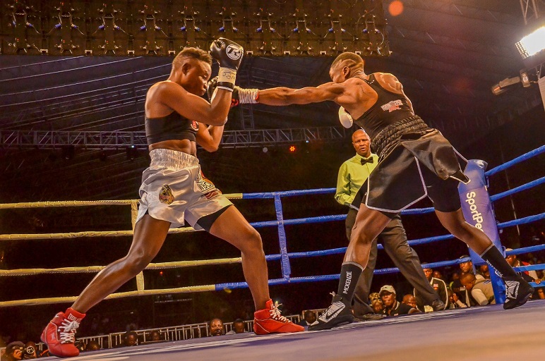 WBC Super Bantamweight Champion Fatuma Zarika punches Zambian Catherine Phiri during their title bout at the KICC on Saturday, March 23, 2019. PHOTO/SPN