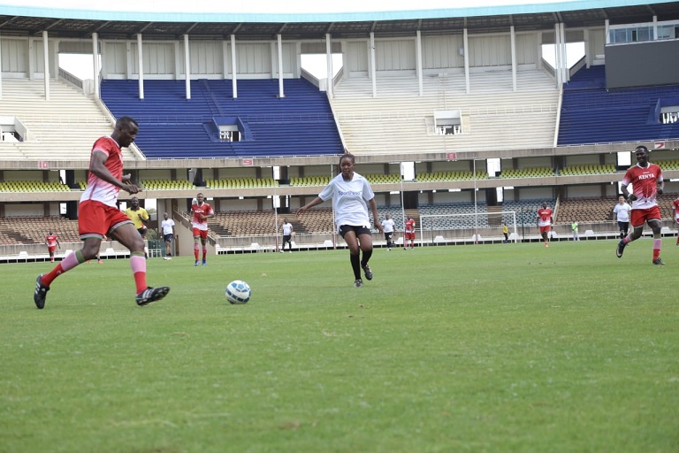 Webuye Member of Parliament, Dan Wanyama contest the ball against SportPesa FC’s  Teresia Akoth at Moi International Sports Centre Kasarani in Nairobi on  February 22, 2019.PHOTO/SPN