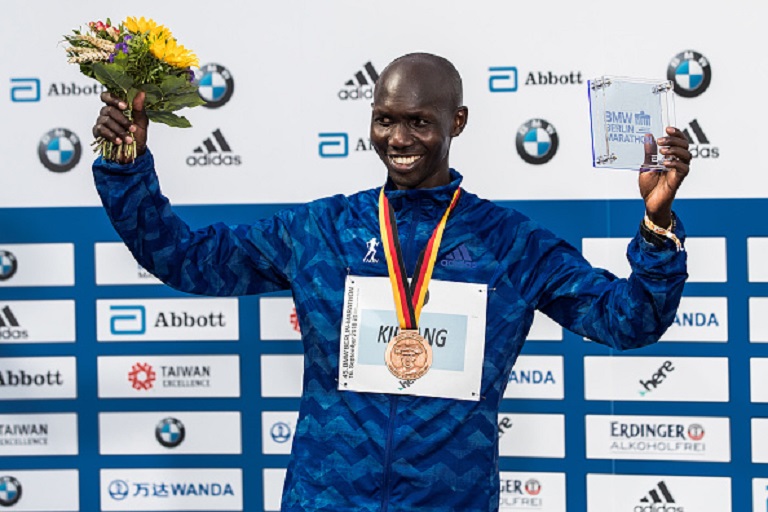 Wilson Kipsang of Kenya celebrates at the podium after finishing third during the Berlin Marathon 2018 on September 16, 2018 in Berlin, Germany. PHOTO/GettyImages