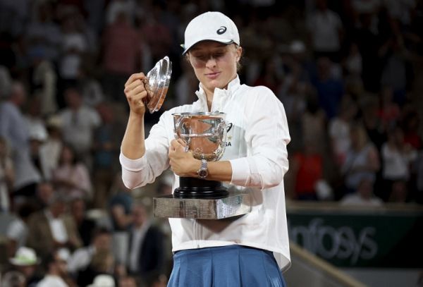 Winner Iga Swiatek of Poland celebrates during the women's final trophy ceremony on day 14 of Roland-Garros 2022, French Open 2022, second Grand Slam tennis tournament of the season on June 4, 2022 at Roland-Garros stadium in Paris, France. PHOTO | AFP