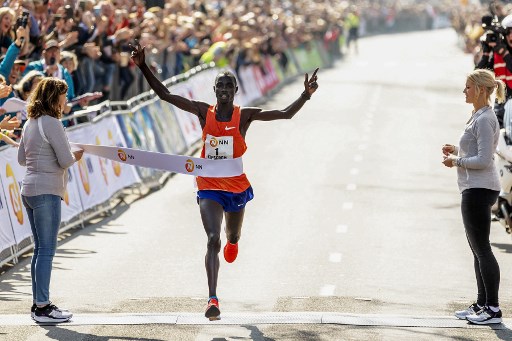 Winner Marius Kipserem from Kenya celebrates as he crosses the finish line of the 39th Rotterdam Marathon in Rotterdam, on April 7, 2019. PHOTO/AFP