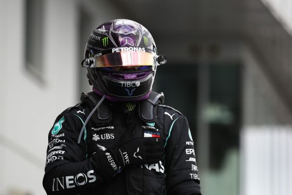 Winner Mercedes' British driver Lewis Hamilton celebrates on the podium after the German Formula One Eifel Grand Prix at the Nuerburgring circuit in Nuerburg, western Germany, on October 11, 2020. PHOTO | AFP