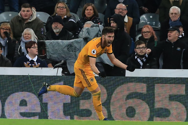 Wolverhampton Wanderers' Irish defender Matt Doherty celebrates after scoring their late winner during the English Premier League football match between Newcastle United and Wolverhampton Wanderers at St James' Park in Newcastle-upon-Tyne, north east England on December 9, 2018. Wolves won the game 2-1. PHOTO/AFP