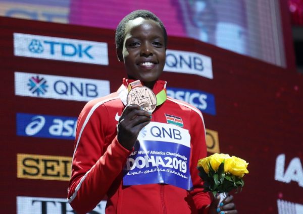 World Athletics Championships - Doha 2019 - Women's 10,000 Metres - Khalifa International Stadium, Doha, Qatar - September 29, 2019 Bronze medalist Kenya's Agnes Jebet Tirop during the medal ceremony. PHOTO | Alamy