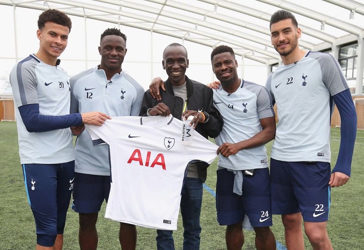 World marathon record holder, Eliud Kipchoge (middle) poses with Tottenham Hotspur FC stars (From L to R) Dele Alli, Victor Wanyama, Serge Aurier and Paulo Gazzaniga when he visited the English Premier League club's training complex in April following his London Marathon victory. PHOTO/File