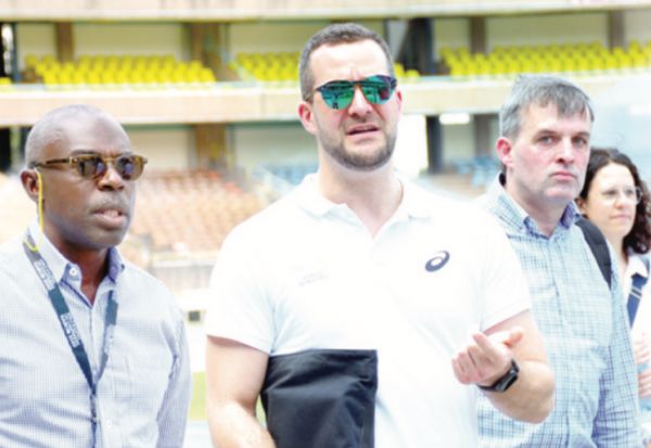 World U20 LOC boss Mike Rabar (left) with World Athletics officials at Kasarani Stadium last week. PHOTO | PD