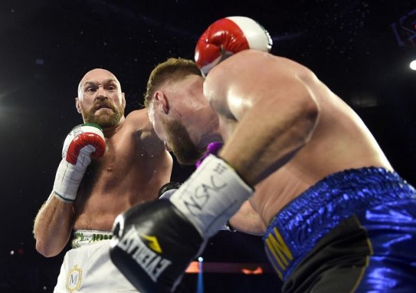 yson Fury (L) and Otto Wallin fight during their heavyweight bout at T-Mobile Arena on September 14, 2019 in Las Vegas, Nevada. Tyson won by an unanimous decision after the 12-round bout. PHOTO | AFP