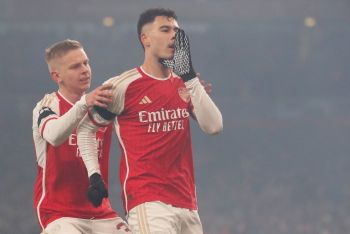 Arsenal survive late Wolves scare to open four-point lead